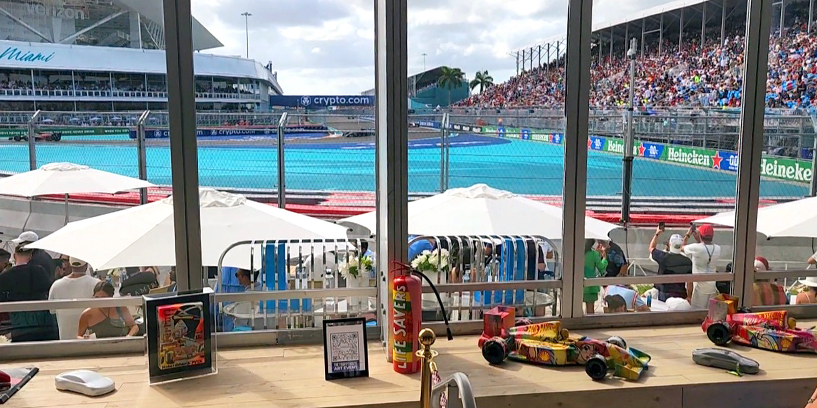 view of a curve of the Hard Rock Stadium racing track seen from a VIP seating area